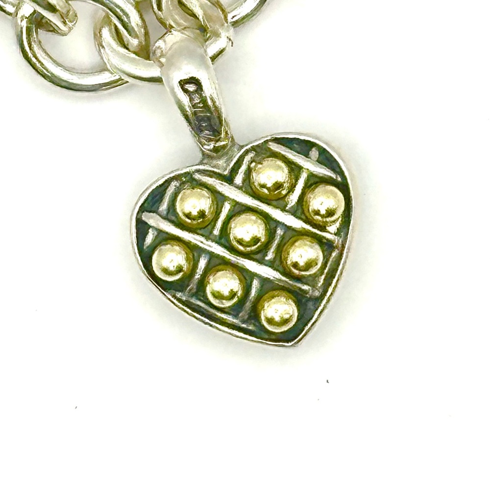Lagos Caviar Two Tone Silver & 18 Kt Gold Reversible Heart Charm Bracelet - Picture 2 of 9
